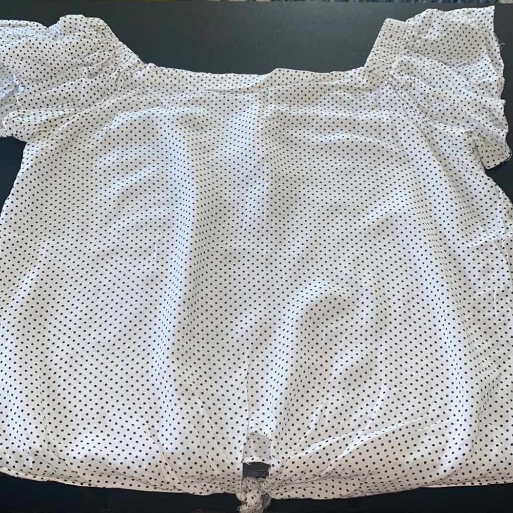 Cherry’s polka-dot blouse. Size M. Color white with black polka-dots